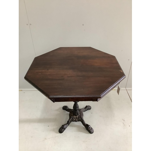 62 - A late Victorian octagonal mahogany and cast iron centre table, width 75cm, height 72cm.  Condition ... 