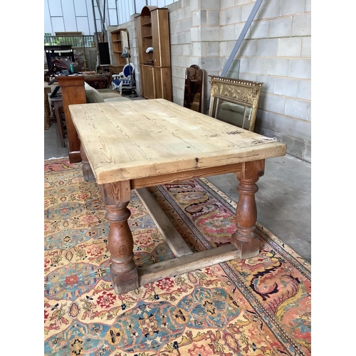 83 - An 18th century style rectangular pine refectory dining table, width 220cm, depth 102cm, height 78cm... 