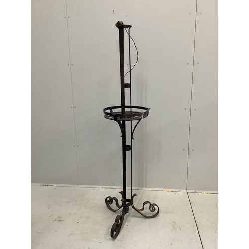 9 - An early 20th century French wrought iron medieval style standard lamp, height 160cm.  Condition - f... 