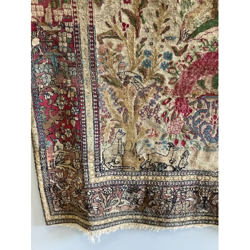 1004 - An antique Isphahan garden design ivory ground rug, approximately 200 x 130cm. Condition - fair... 