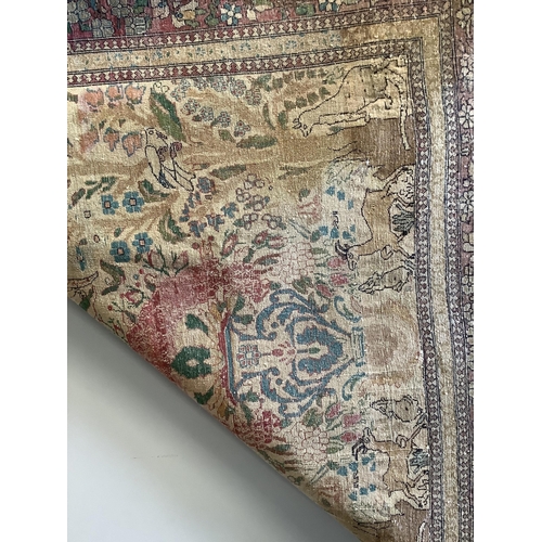 1004 - An antique Isphahan garden design ivory ground rug, approximately 200 x 130cm. Condition - fair... 