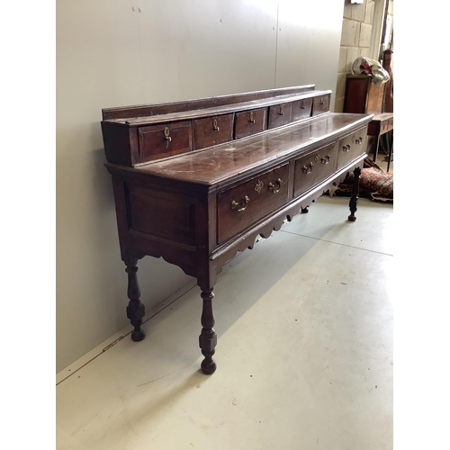 1007 - A mid 18th century oak low dresser, width 207cm, depth 46cm, height 97cm. Condition - fair