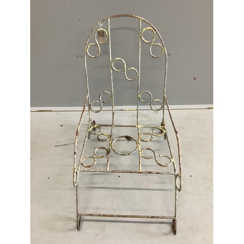 1011 - A vintage French wrought iron garden chair, width 48cm, depth 74cm, height 76cm. Condition - fair... 