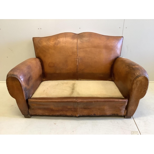 1016 - A French leather moustache back sofa, width 148cm, depth 80cm, height 80cm. Condition - poor