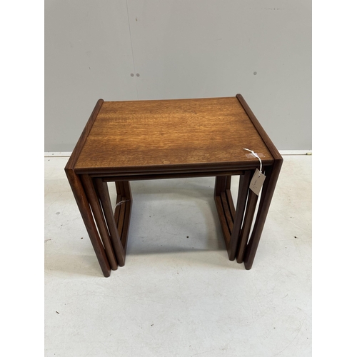 1018 - A nest of three mid century G Plan teak tea tables, width 53cm, depth 43cm, height 49cm. Condition -... 