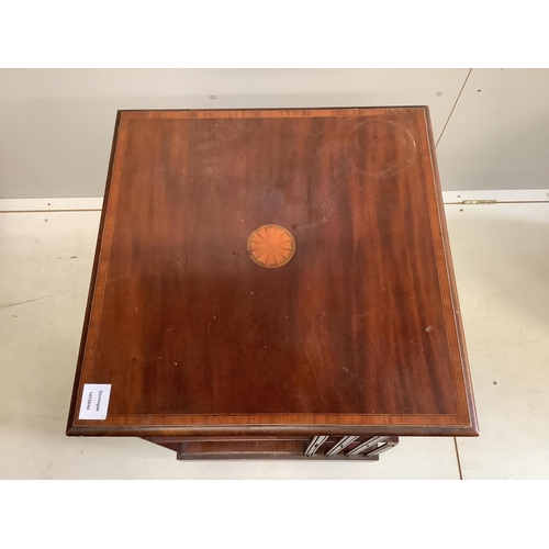 1028 - An Edwardian inlaid mahogany revolving bookcase, width 47cm, depth 47cm, height 84cm. Condition - po... 