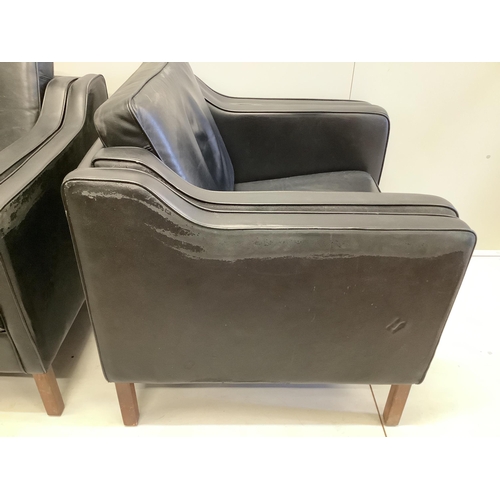 1042 - In the manner of Morgensen, a pair of black leatherette armchairs, width 92cm, depth 80cm, height 82... 