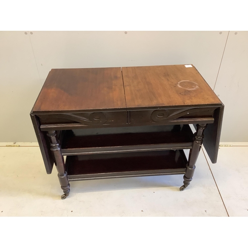 1058 - A Victorian mahogany drop flap three tier side table, width 89cm, depth 45cm, height 72cm. Condition... 