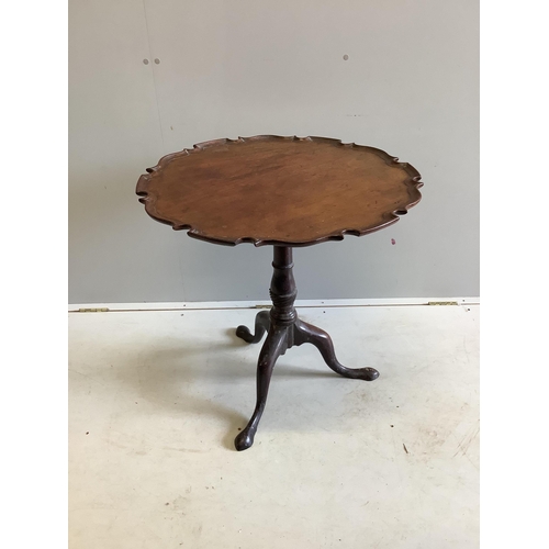 1059 - A George III circular mahogany tilt top tea table, diameter 70cm, height 68cm. Condition - fair... 