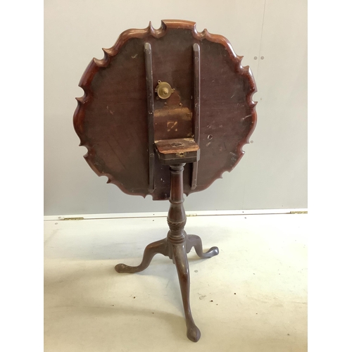 1059 - A George III circular mahogany tilt top tea table, diameter 70cm, height 68cm. Condition - fair... 