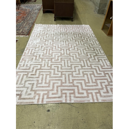 1066 - A Contemporary geometric pink ground carpet, 300 x 200cm. Condition - fair