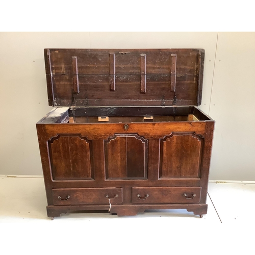 1087 - An 18th century panelled oak mule chest, adapted, width 152cm, depth 54cm, height 92cm. Condition - ... 