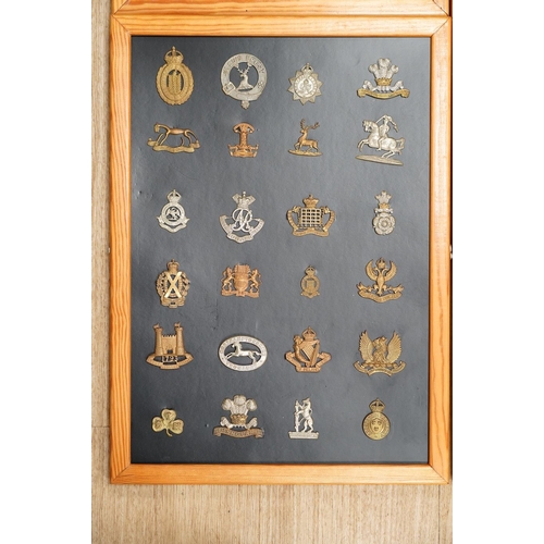 1383 - A collection of ninety-seven military cap badges mounted on four boards including; The City of Londo... 