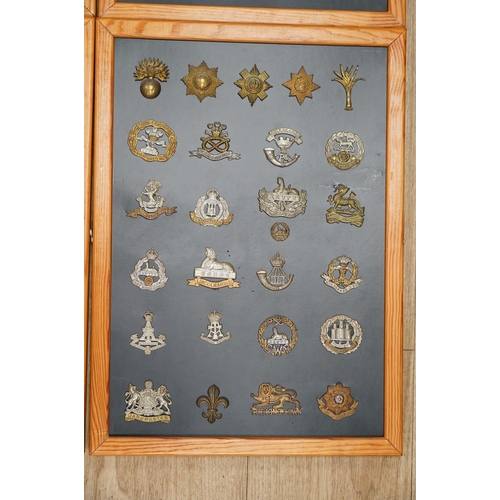 1383 - A collection of ninety-seven military cap badges mounted on four boards including; The City of Londo... 