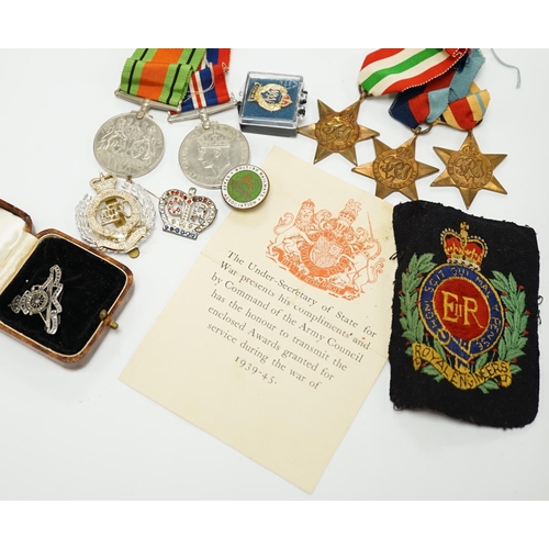 1392 - A WWII medal group, comprising of the 1939-1945 War Medal, the Defence Medal, the Africa Star, the I... 