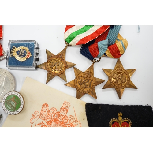 1392 - A WWII medal group, comprising of the 1939-1945 War Medal, the Defence Medal, the Africa Star, the I... 