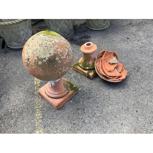 1007 - A large pair of weathered terracotta sphere garden ornaments, one in need of restoration, height 58c... 