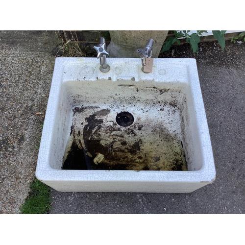 1028 - A rectangular enamelled sink, width 62cm, depth 56cm, height 28cm. Condition - fair