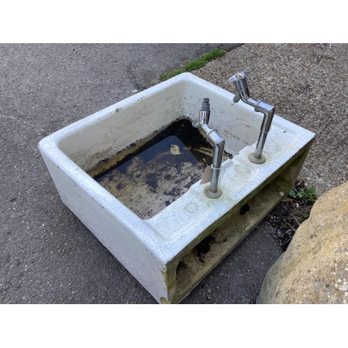 1028 - A rectangular enamelled sink, width 62cm, depth 56cm, height 28cm. Condition - fair