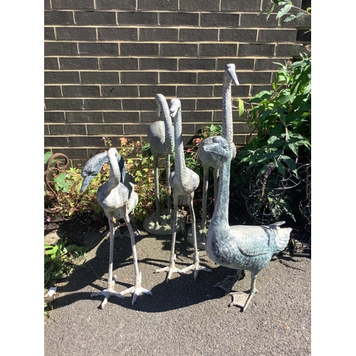 1036 - Six faux lead stork and geese garden ornaments, largest height 92cm. Condition - fair