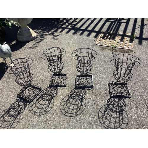 1037 - A set of four wirework plant holders, diameter 27cm, height 40cm. Condition - good