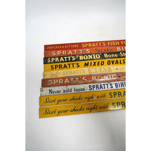 1256 - Nine mid century Sprattâs tinplate advertising shelf strips, length 52cm. Condition - poor-fair... 