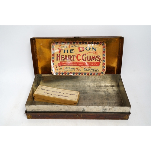 1260 - An early 20th century Carrs novelty 'dice game' biscuit tin, a Don Confectionery 'chessboard' tin an... 