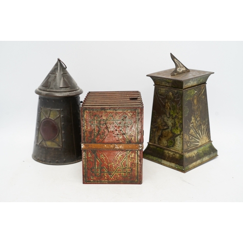 1269 - Three early 20th century Huntley & Palmer novelty biscuit tins, modelled as bound books, a sun dial ... 