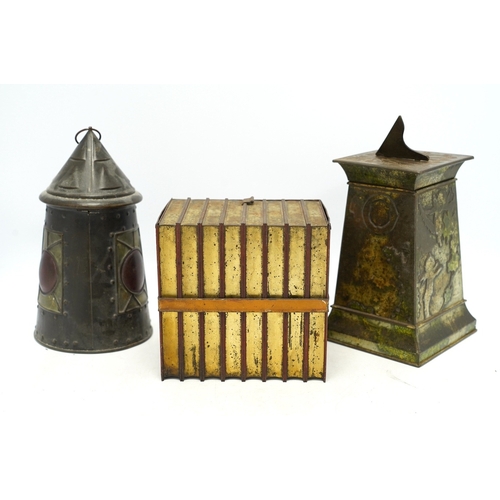 1269 - Three early 20th century Huntley & Palmer novelty biscuit tins, modelled as bound books, a sun dial ... 