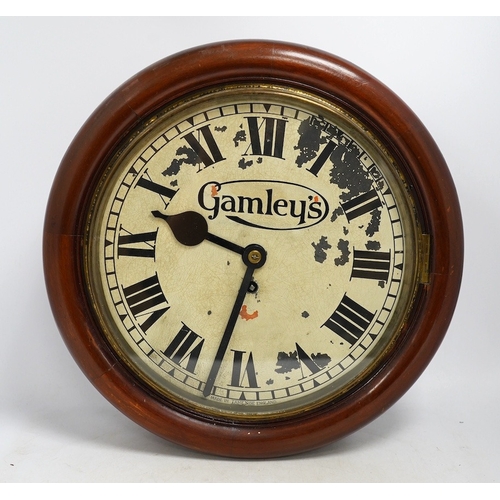 1273 - An early 20th century mahogany single fusee Gamleys advertising dial clock, 39cm diameter. Condition... 