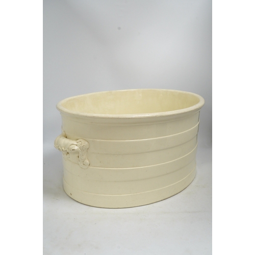 1276 - A Victorian Copeland & Garrett 'New Fayence' oval two handled footbath, 56cm wide, 26cm high. Condit... 