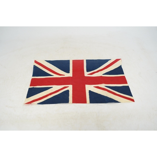 1282 - A vintage Union flag, approximately 240 x 120cm, a smaller âSaleâ flag and other assorted flags ... 