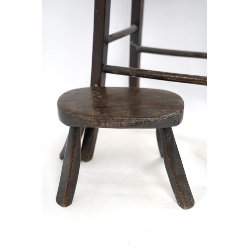 1286 - A Victorian elm and beech stool, 54cm high, together with a smaller child's stool. Condition - fair... 