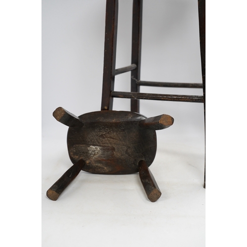 1286 - A Victorian elm and beech stool, 54cm high, together with a smaller child's stool. Condition - fair... 