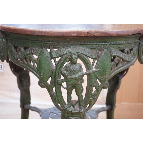 1294 - A rare early 20th century Boer War commemorative cast iron pub table, decorated with standing soldie... 