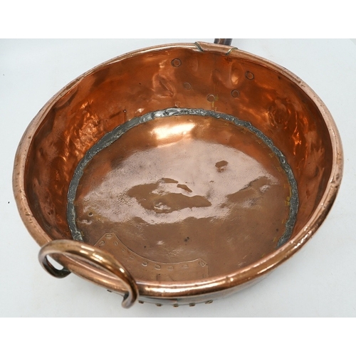 1295 - Two copper pans, one handled and the other with cover, 38cm diameter. Condition - fair