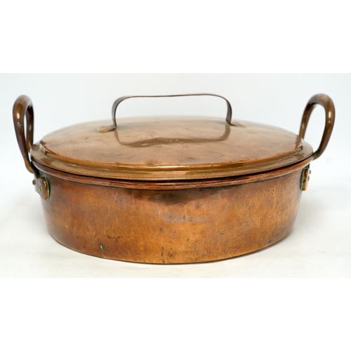 1295 - Two copper pans, one handled and the other with cover, 38cm diameter. Condition - fair