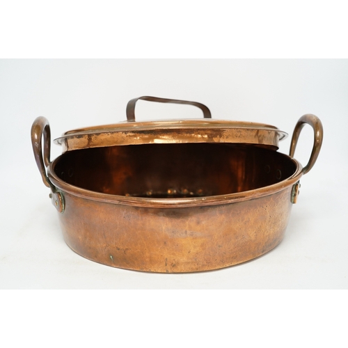 1295 - Two copper pans, one handled and the other with cover, 38cm diameter. Condition - fair