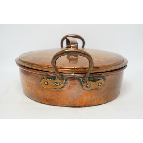 1295 - Two copper pans, one handled and the other with cover, 38cm diameter. Condition - fair