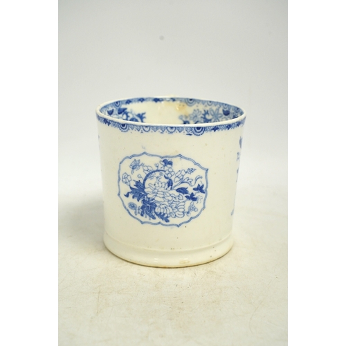 1303 - An early Victorian blue and white bone china mug, 13cm high. Condition - fair, crack to the handle... 