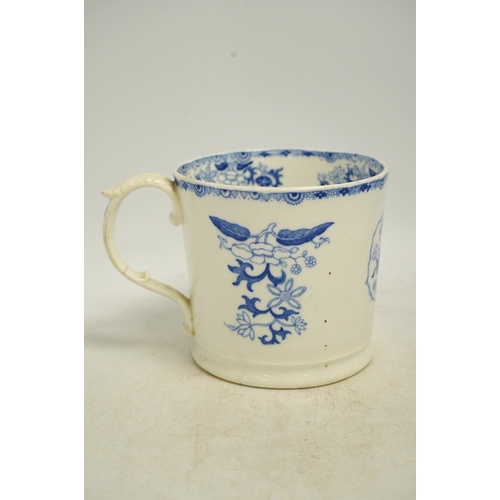 1303 - An early Victorian blue and white bone china mug, 13cm high. Condition - fair, crack to the handle... 