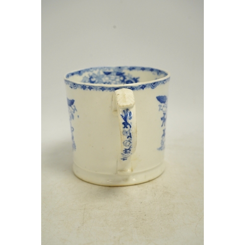 1303 - An early Victorian blue and white bone china mug, 13cm high. Condition - fair, crack to the handle... 