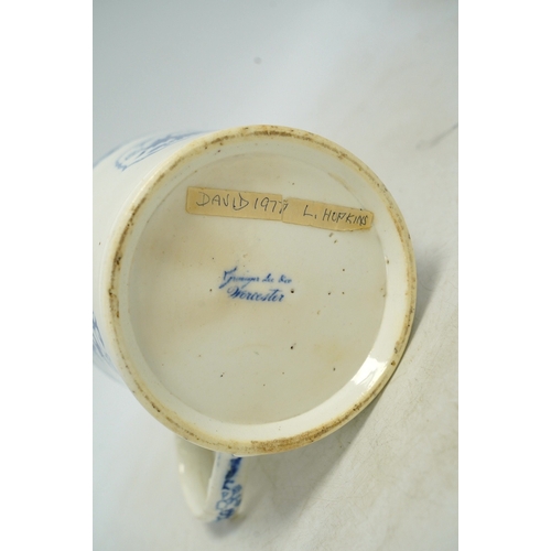 1303 - An early Victorian blue and white bone china mug, 13cm high. Condition - fair, crack to the handle... 