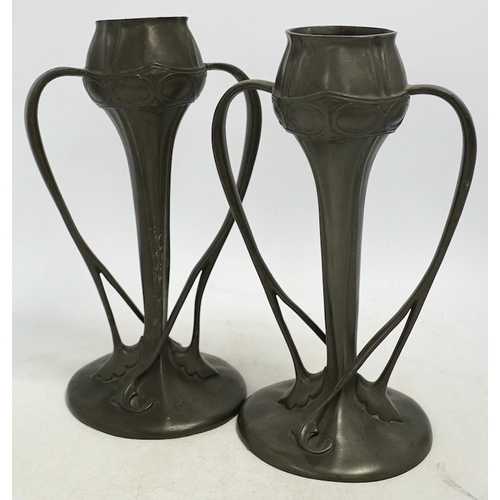 1307 - A pair of Art Nouveau Liberty Tudric pewter twin-handled vases, stamped to the bases, 25cm high. Con... 