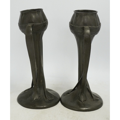 1307 - A pair of Art Nouveau Liberty Tudric pewter twin-handled vases, stamped to the bases, 25cm high. Con... 