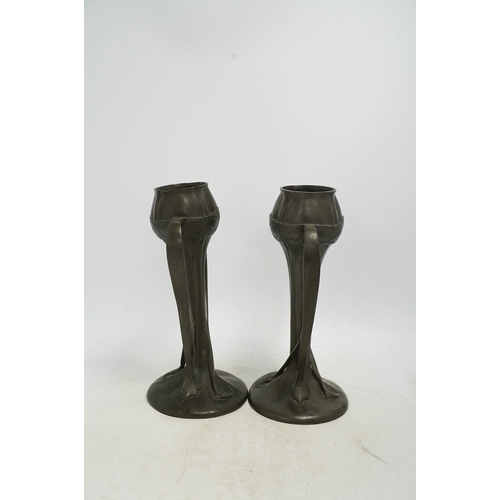 1307 - A pair of Art Nouveau Liberty Tudric pewter twin-handled vases, stamped to the bases, 25cm high. Con... 