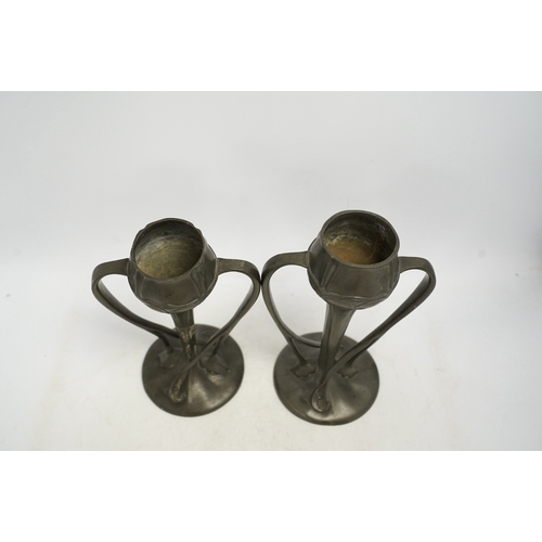 1307 - A pair of Art Nouveau Liberty Tudric pewter twin-handled vases, stamped to the bases, 25cm high. Con... 