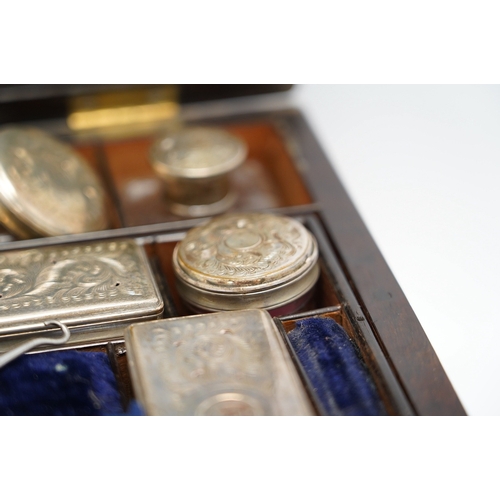 1314 - A Victorian rosewood toilet box with silver plate lidded bottles, âsecretâ draw and leather case... 