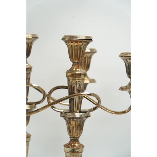 1319 - A pair of 19th century Old Sheffield plate three light, two branch candelabra, 44cm high. Condition ... 