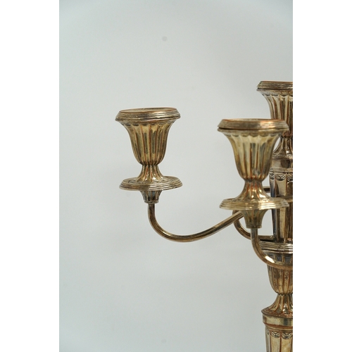 1319 - A pair of 19th century Old Sheffield plate three light, two branch candelabra, 44cm high. Condition ... 